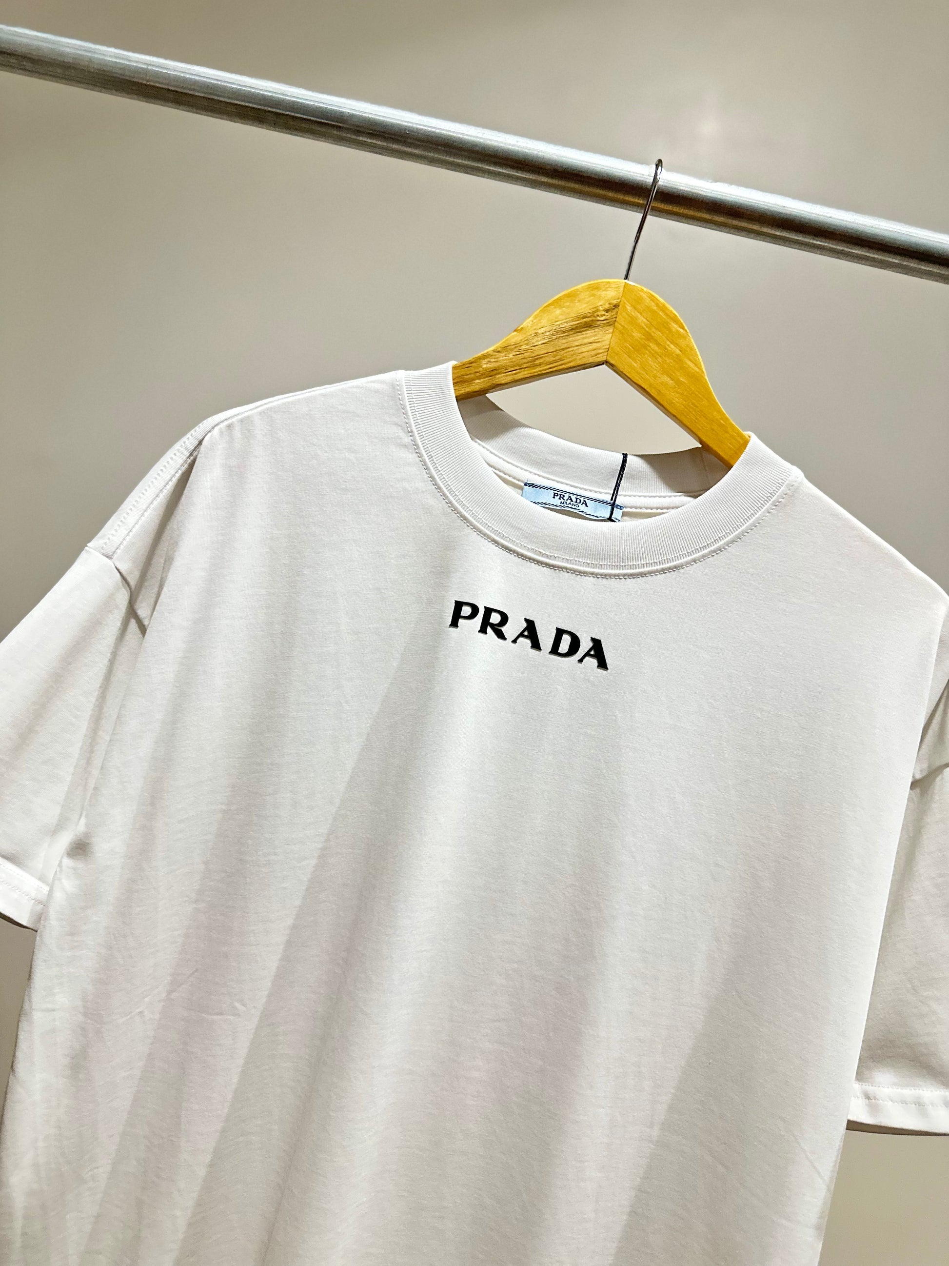 Shop PRADA Classic Re-Nylon and jersey T-shirt front pocket UJN661